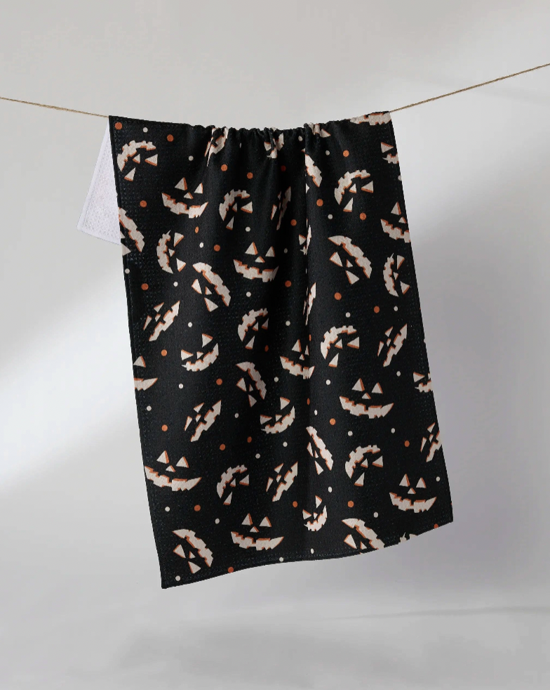 Haunted Grin Tea Towel