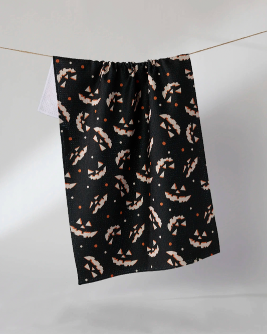 Haunted Grin Tea Towel